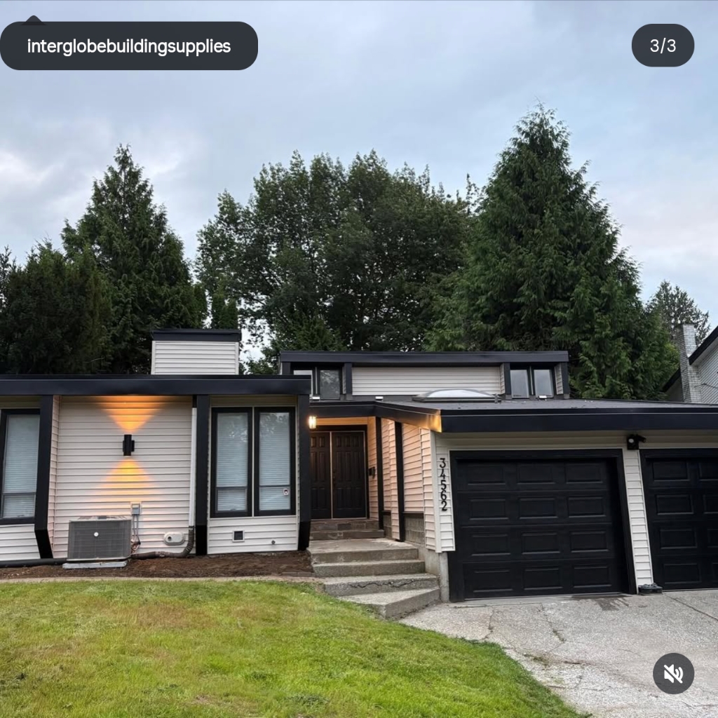 Finished home exterior with black trim and gutters